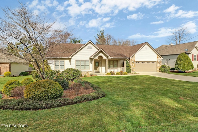 18 Inwood Dr, Fairfield Glade, TN 38558 - ranch-style home with a garage, a front lawn, concrete driveway, and a porch