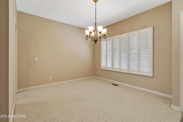 18 Inwood Dr, Fairfield Glade, TN 38558 - spare room featuring baseboards, a notable chandelier, and visible vents