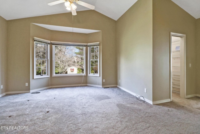 18 Inwood Dr, Fairfield Glade, TN 38558 - empty room featuring carpet flooring, visible vents, baseboards, ceiling fan, and vaulted ceiling
