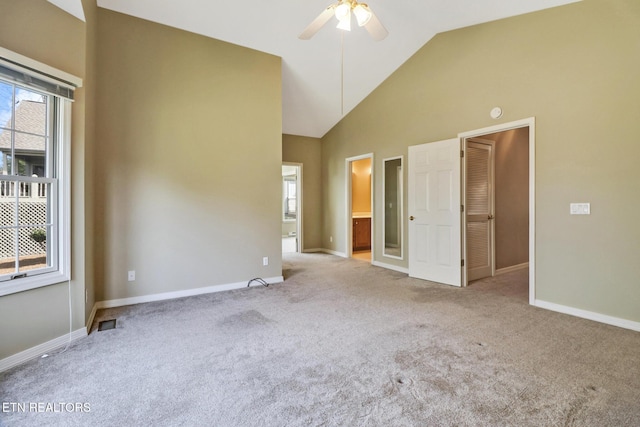 18 Inwood Dr, Fairfield Glade, TN 38558 - unfurnished bedroom featuring visible vents, high vaulted ceiling, carpet, and baseboards