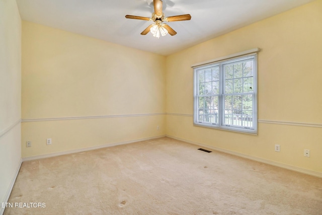 18 Inwood Dr, Fairfield Glade, TN 38558 - spare room with carpet, baseboards, ceiling fan, and visible vents