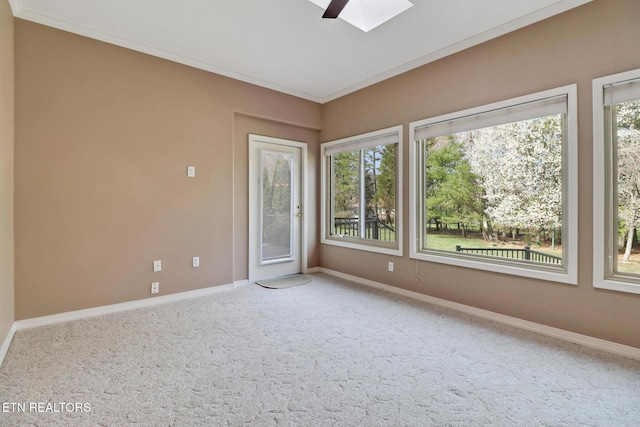 18 Inwood Dr, Fairfield Glade, TN 38558 - unfurnished room with carpet flooring, a skylight, crown molding, and baseboards