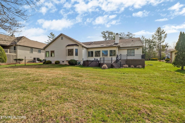 18 Inwood Dr, Fairfield Glade, TN 38558 - back of house featuring crawl space, a chimney, cooling unit, a deck, and a lawn