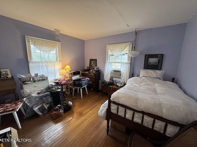 108 W Red Bud Rd, Knoxville, TN 37920 - bedroom with cooling unit and wood finished floors