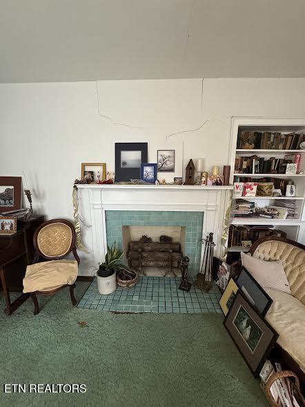 108 W Red Bud Rd, Knoxville, TN 37920 - carpeted living area with a tile fireplace
