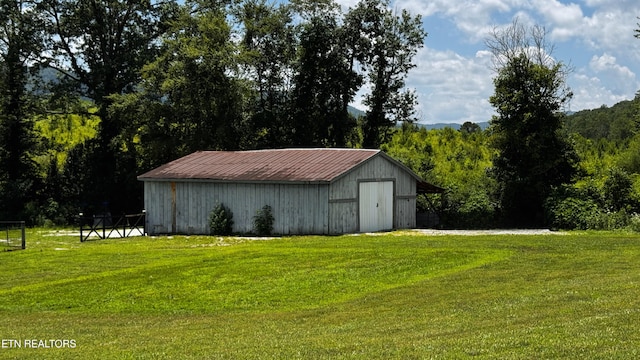 580 Elk Fork Rd, Pioneer, TN 37847 - view of pole building featuring a lawn and a view of trees