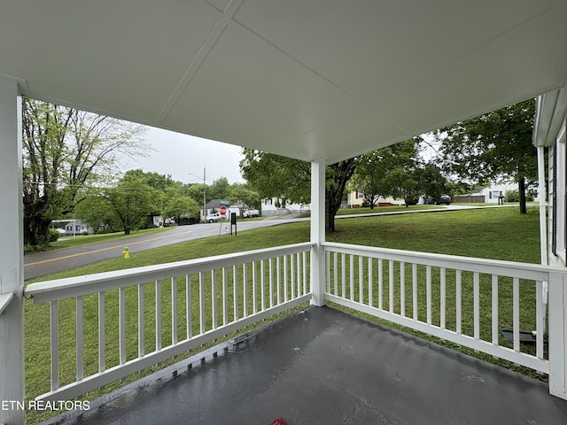 view of patio featuring a porch