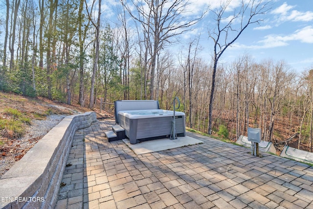 view of patio featuring a hot tub