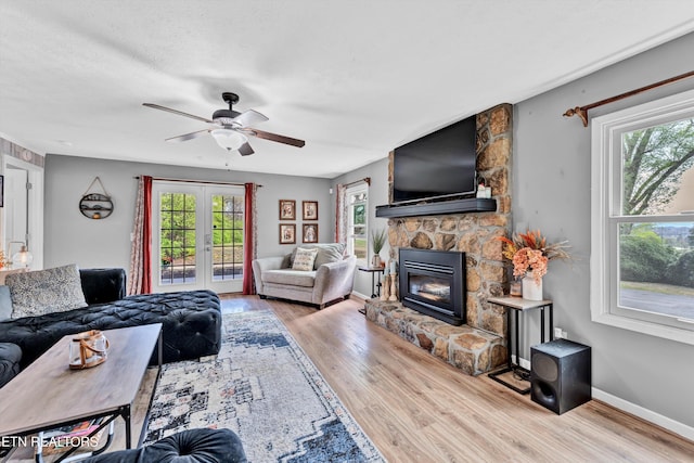 1533 Middlesettlements Rd, Maryville, TN 37801 - living area with ceiling fan, baseboards, wood finished floors, and a fireplace