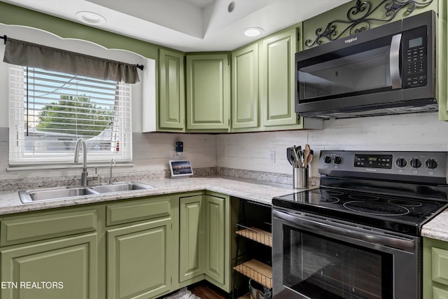 1533 Middlesettlements Rd, Maryville, TN 37801 - kitchen with green cabinets, stainless steel range with electric cooktop, and a sink