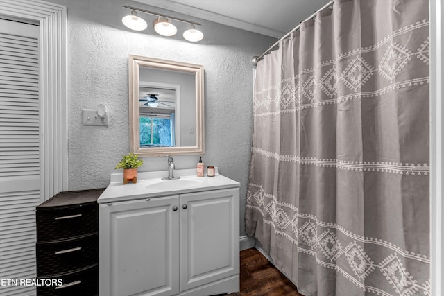 1533 Middlesettlements Rd, Maryville, TN 37801 - bathroom with a textured wall, vanity, crown molding, and wood finished floors