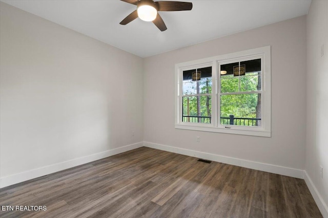 520 Ridge Rd, Caryville, TN 37714 - empty room with baseboards, wood finished floors, and ceiling fan