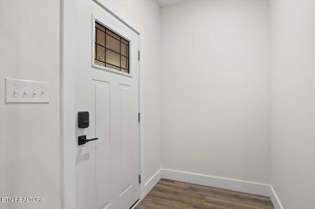 520 Ridge Rd, Caryville, TN 37714 - doorway with baseboards and dark wood finished floors