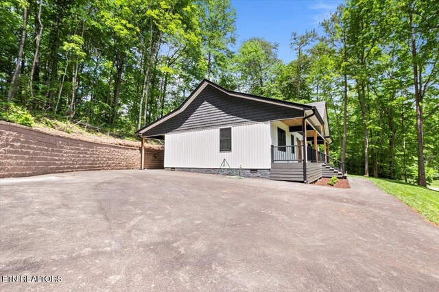 520 Ridge Rd, Caryville, TN 37714 - view of side of home with crawl space and driveway