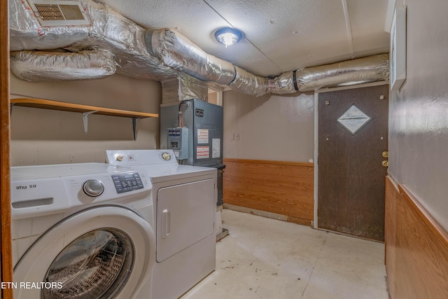 275 White Oak Rd, Oakdale, TN 37829 - laundry room featuring a wainscoted wall, separate washer and dryer, and visible vents