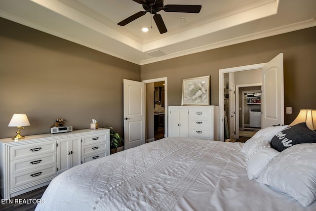 bedroom featuring crown molding, recessed lighting, a raised ceiling, ceiling fan, and wood finished floors