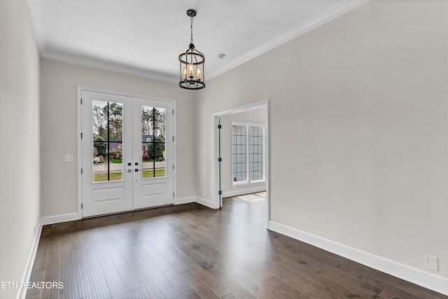foyer featuring dark wood-type flooring, french doors, baseboards, and an inviting chandelier