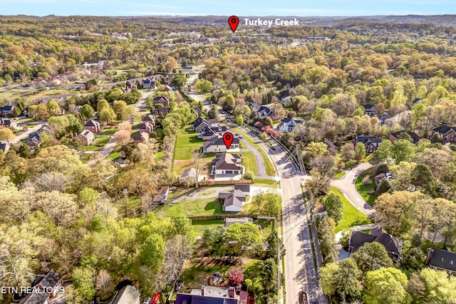 aerial view with a forest view and a residential view