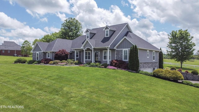 8500 N Ruggles Ferry Pike, Strawberry Plains, TN 37871 - view of front of property with stone siding, board and batten siding, roof with shingles, and a garage