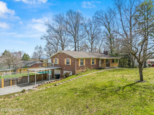 single story home with fence, a chimney, a front lawn, driveway, and a carport