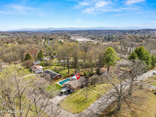 bird's eye view featuring a mountain view and a forest view