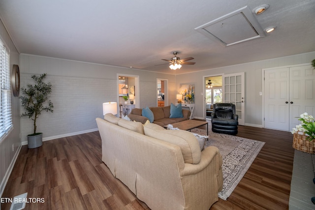 733 Waco Rd, Knoxville, TN 37919 - living room with attic access, wood finished floors, a ceiling fan, and brick wall