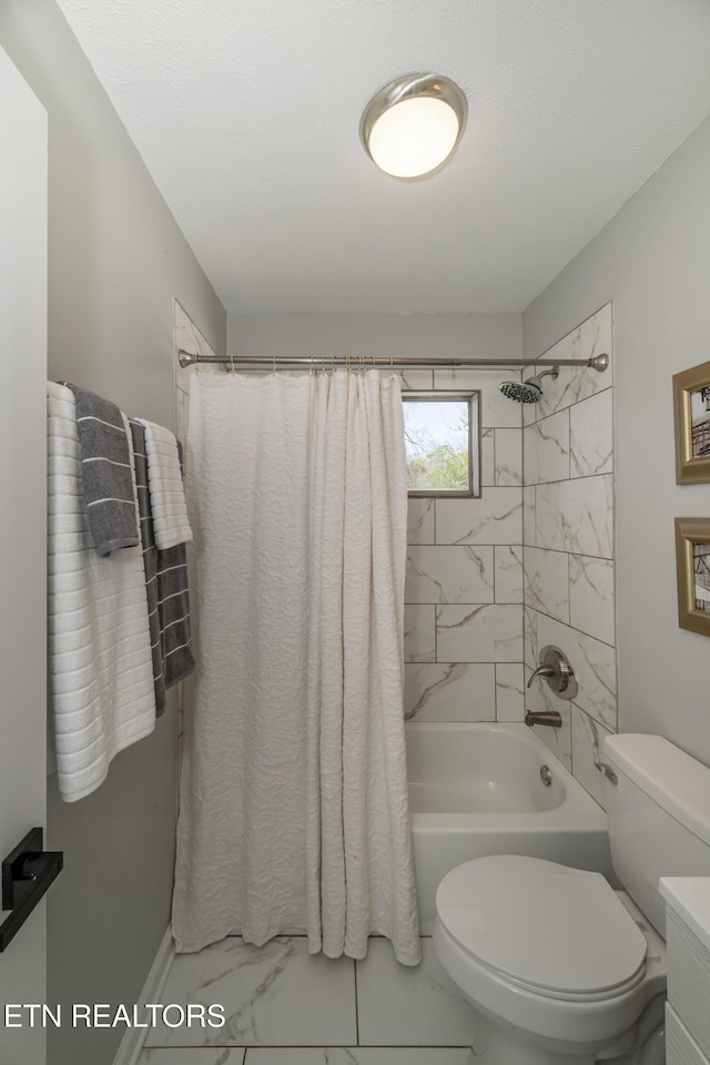 733 Waco Rd, Knoxville, TN 37919 - bathroom featuring marble finish floor, toilet, and shower / bath combo