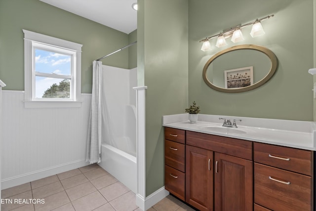 134 At Crumley Rd, Rockford, TN 37853 - bathroom with shower / tub combo with curtain, tile patterned flooring, vanity, and wainscoting