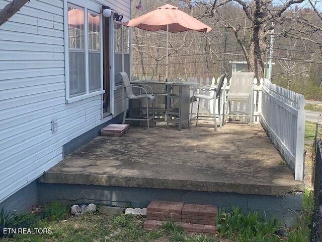 view of patio featuring a wooden deck
