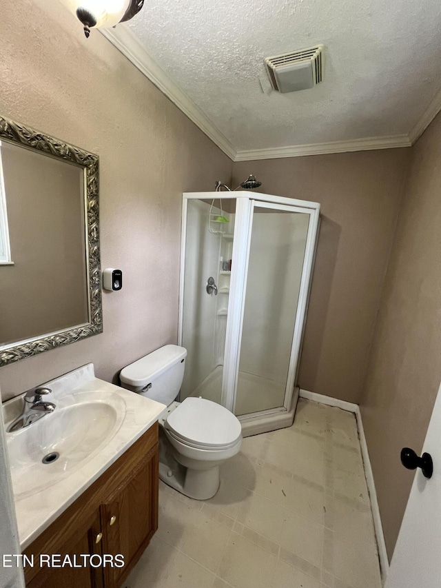 full bathroom with toilet, visible vents, a shower stall, vanity, and ornamental molding