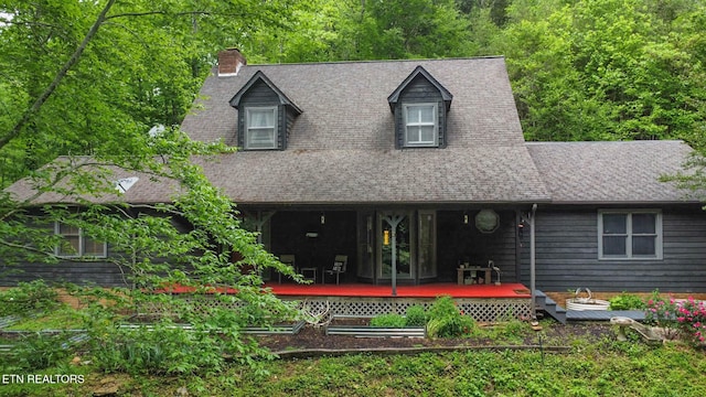 7229 Cooks Hollow Rd, Maryville, TN 37801 - view of front facade with a deck, a chimney, and roof with shingles