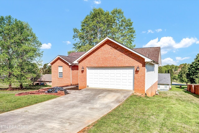 view of front of house featuring concrete driveway, a front yard, brick siding, and an attached garage