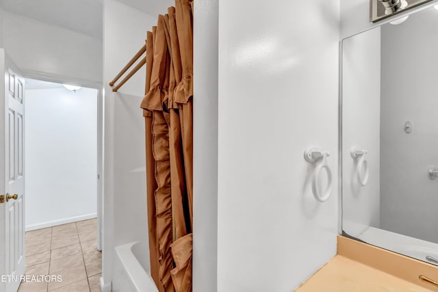 bathroom with a bath, a shower with shower curtain, and tile patterned flooring