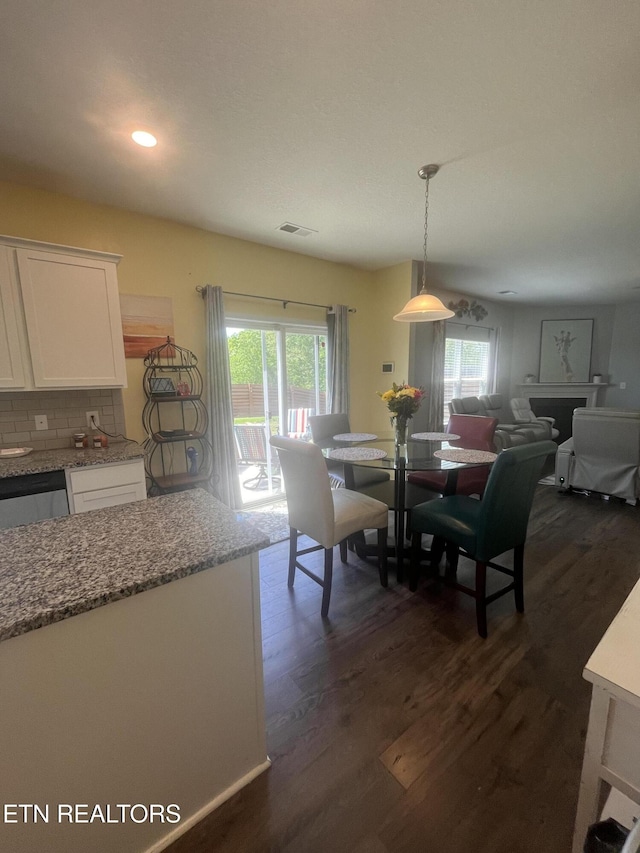 8071 Dennis Fox Ln, Knoxville, TN 37938 - dining space with visible vents, dark wood-style flooring, and recessed lighting