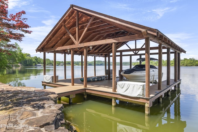 dock area featuring a water view and boat lift