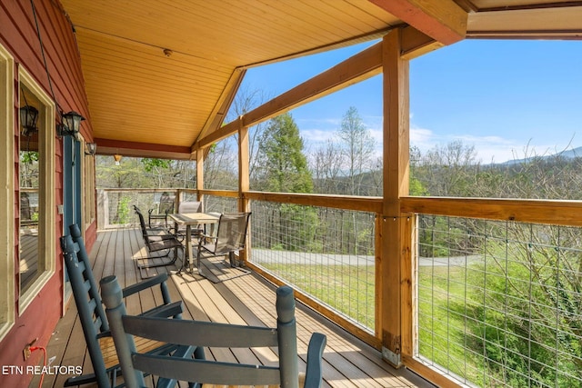 deck featuring outdoor dining space