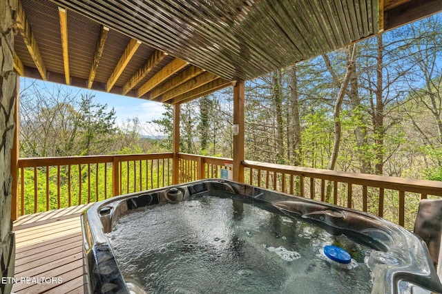 deck with a hot tub