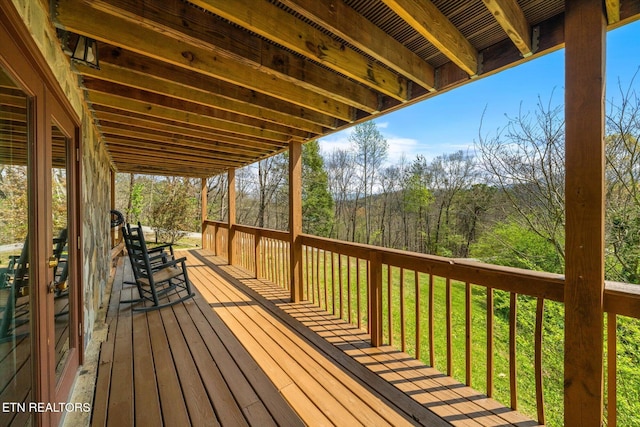 deck with a view of trees