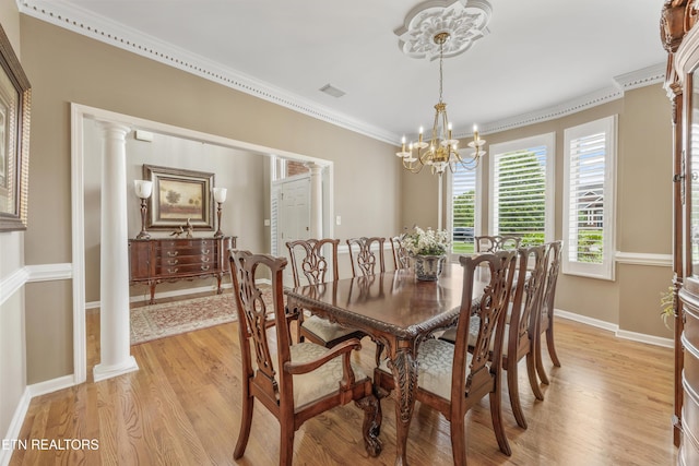 1647 Banebury Ln, Alcoa, TN 37701 - dining area featuring light wood-type flooring, ornamental molding, and a chandelier