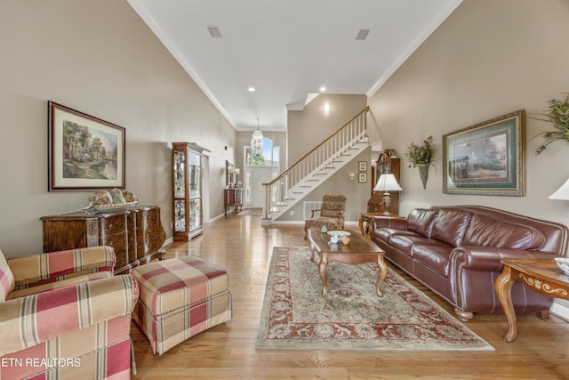 1647 Banebury Ln, Alcoa, TN 37701 - living area with stairway, ornamental molding, wood finished floors, and recessed lighting