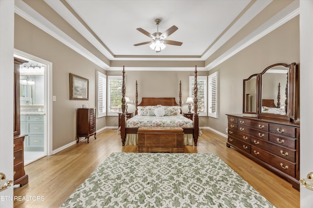 1647 Banebury Ln, Alcoa, TN 37701 - bedroom with a raised ceiling, light wood finished floors, ensuite bath, and crown molding