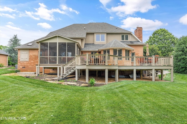 1647 Banebury Ln, Alcoa, TN 37701 - rear view of house with a chimney, a sunroom, a deck, and a yard