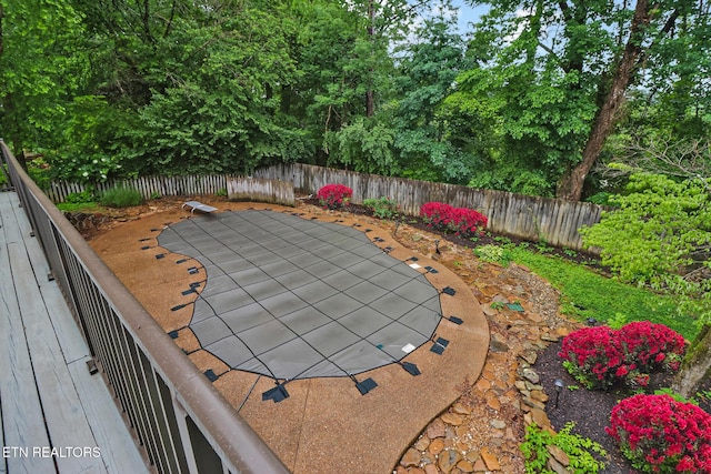 105 W Melbourne Rd, Oak Ridge, TN 37830 - fenced backyard featuring view of wooded area