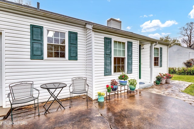 122 Lake View Dr, Knoxville, TN 37920 - exterior space featuring a chimney and a patio area