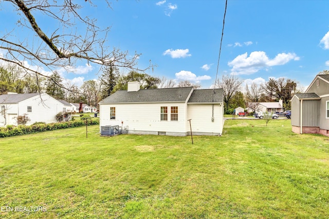 122 Lake View Dr, Knoxville, TN 37920 - back of house featuring a lawn, a chimney, and cooling unit