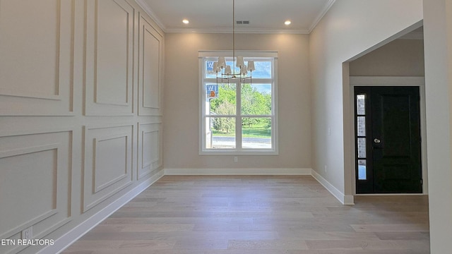 409 Goweli Trl, Vonore, TN 37885 - unfurnished dining area with a chandelier, light wood finished floors, baseboards, ornamental molding, and recessed lighting