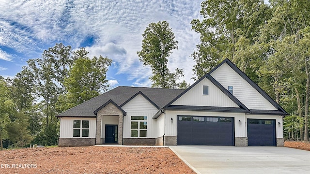 409 Goweli Trl, Vonore, TN 37885 - modern inspired farmhouse featuring a garage and concrete driveway