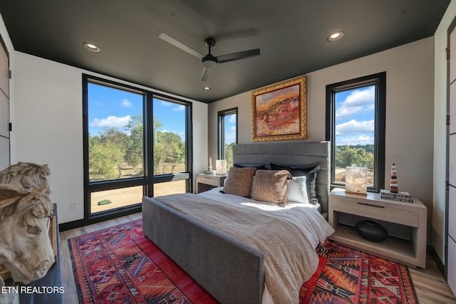 210 Granite Dr, Sevierville, TN 37876 - bedroom featuring a ceiling fan, recessed lighting, and light wood-type flooring