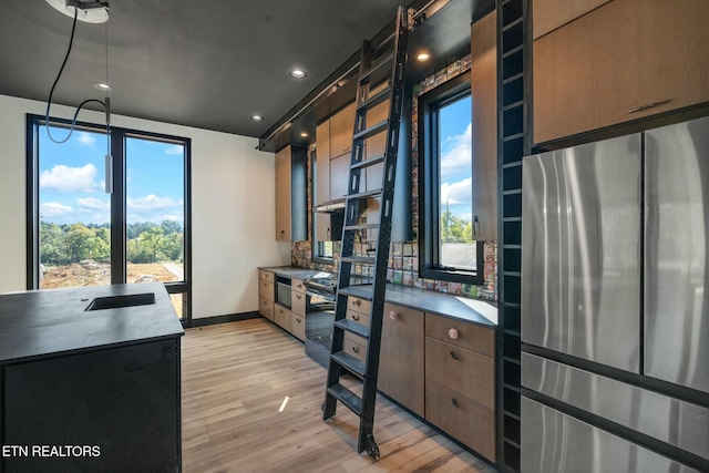 210 Granite Dr, Sevierville, TN 37876 - kitchen featuring freestanding refrigerator, light wood-type flooring, baseboards, electric stove, and recessed lighting
