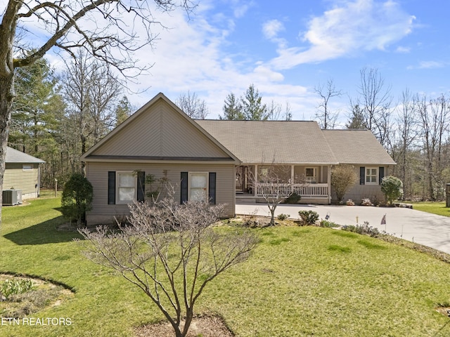 118 Windsor Rd, Crossville, TN 38558 - view of front of home featuring a front lawn, central air condition unit, a porch, and concrete driveway